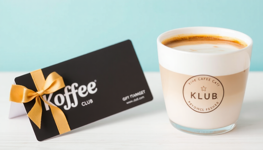 A 'Koffee Klub' gift card next to a cup of specialty coffee