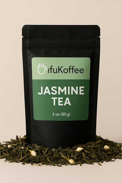 UfuKoffee jasmine tea bags in black resealable pouch surrounded by loose jasmine tea leaves